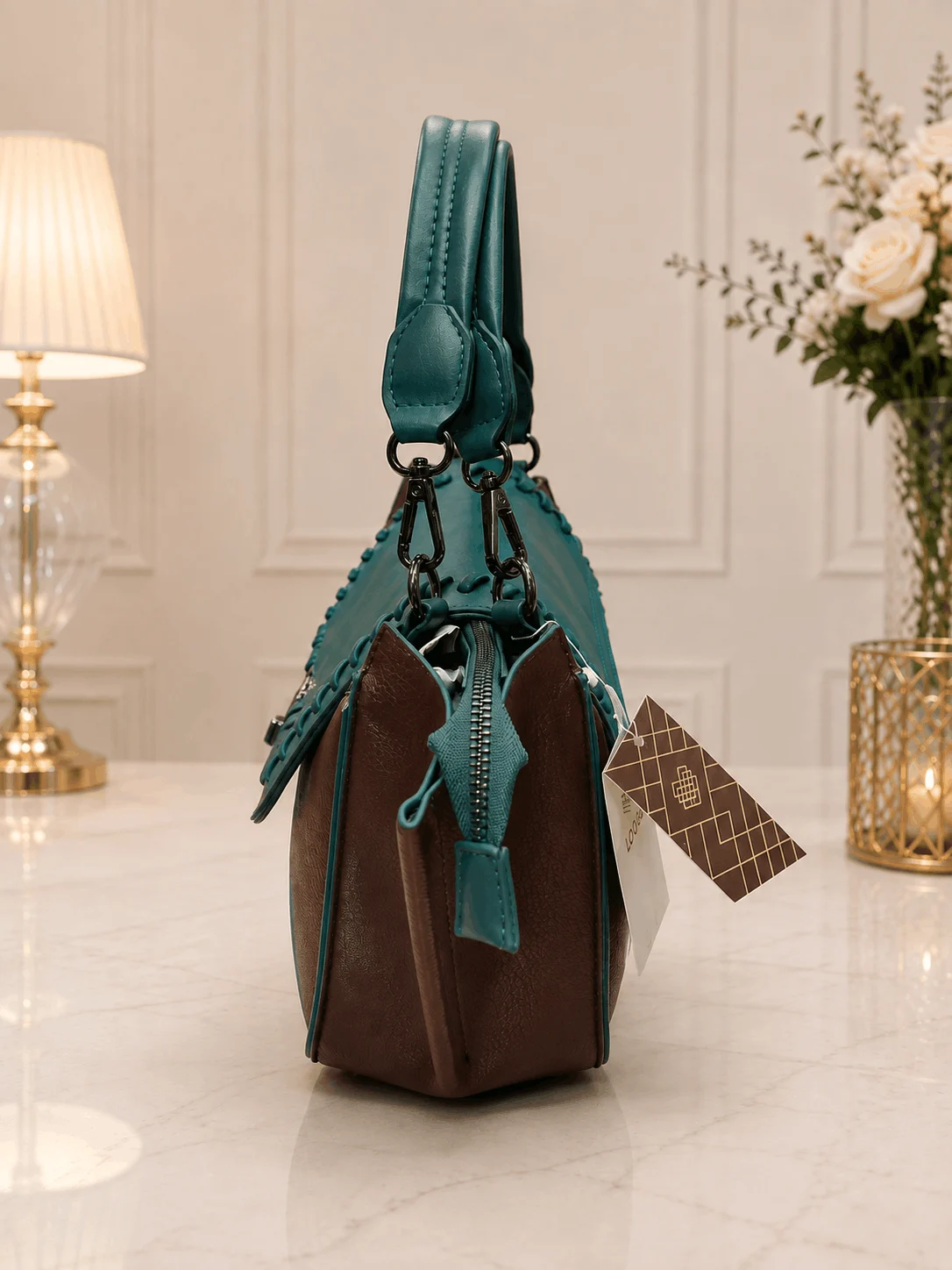 ÉLANORA Premium Brown & Teal Women’s Handbag (2) ÉLANORA premium brown and teal women’s handbag with elegant stitched flap, spacious interior and structured design