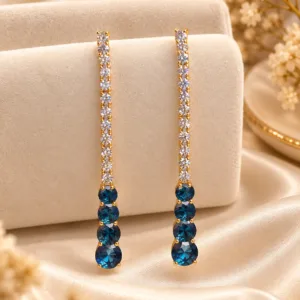18K gold plated blue stone drop earrings with sparkling clear stones and an elegant elongated design