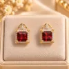 Stunning 18K Gold Plated Zirconia Earrings with square red gemstone and sparkling halo