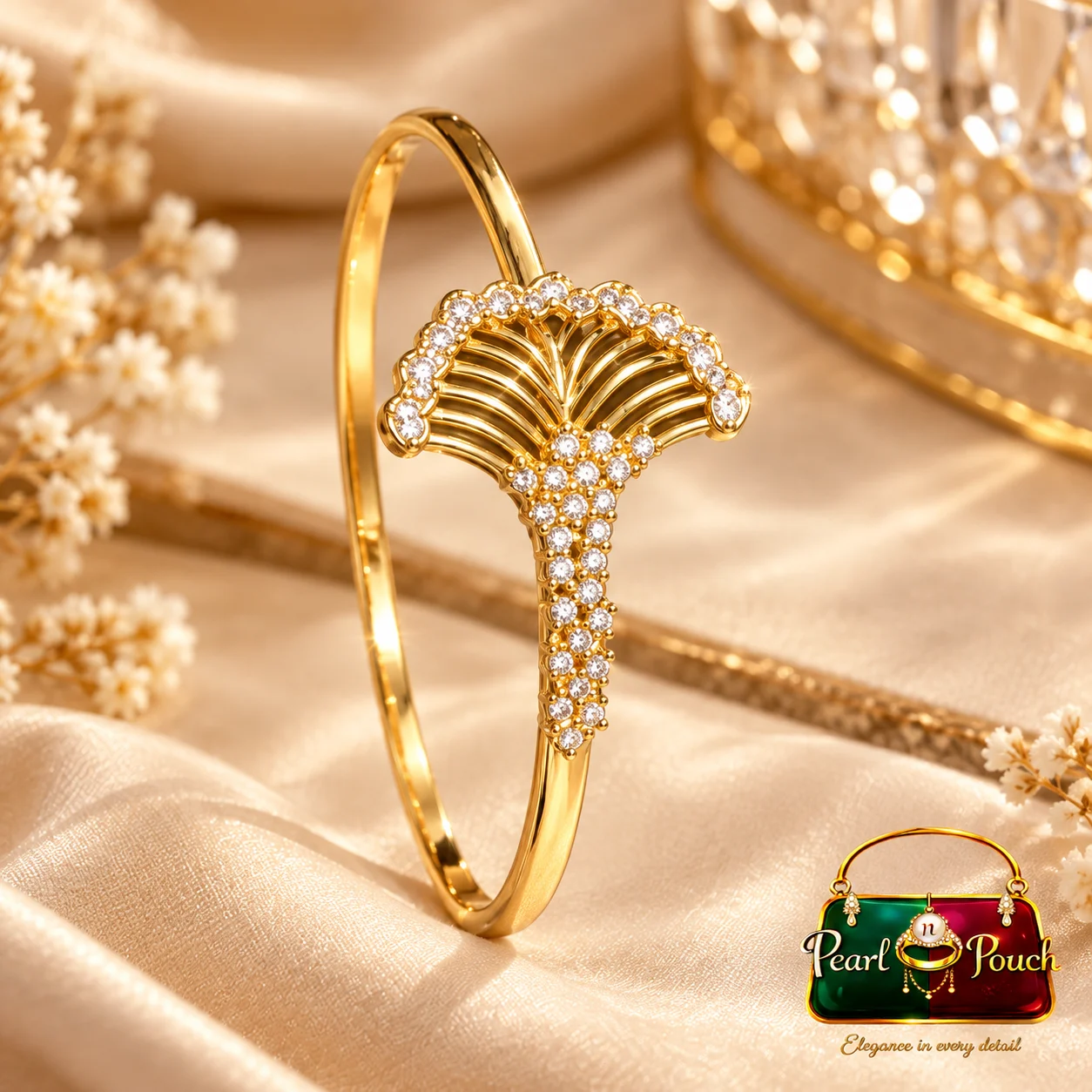 Elegant 18K Gold-Plated Zirconia Fan Design Bangle (5) Elegant 18K Gold-Plated Zirconia Bangle by Pearl n Pouch with 2 cm fan-inspired centre motif