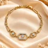 18K Gold Plated Zirconia Bracelet with geometric hexagon links and clear zirconia stones