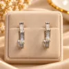 Elegant Silver Plated Hoop Earrings with curved design and clear decorative stone detailing