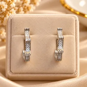 Elegant Silver Plated Hoop Earrings with curved design and clear decorative stone detailing