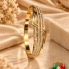 ZUPING 18K Gold Plated Zirconia bracelet displayed upright with geometric centre detailing