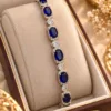 Elegant Silver-Plated Zirconia Bracelet by ZUPING with blue stones and sparkling zirconia accents