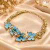 Exquisite 18K Gold Plated Zirconia Bracelet with blue butterfly motifs and adjustable chain