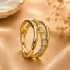 Gold-tone double band ring with sparkling clear stones