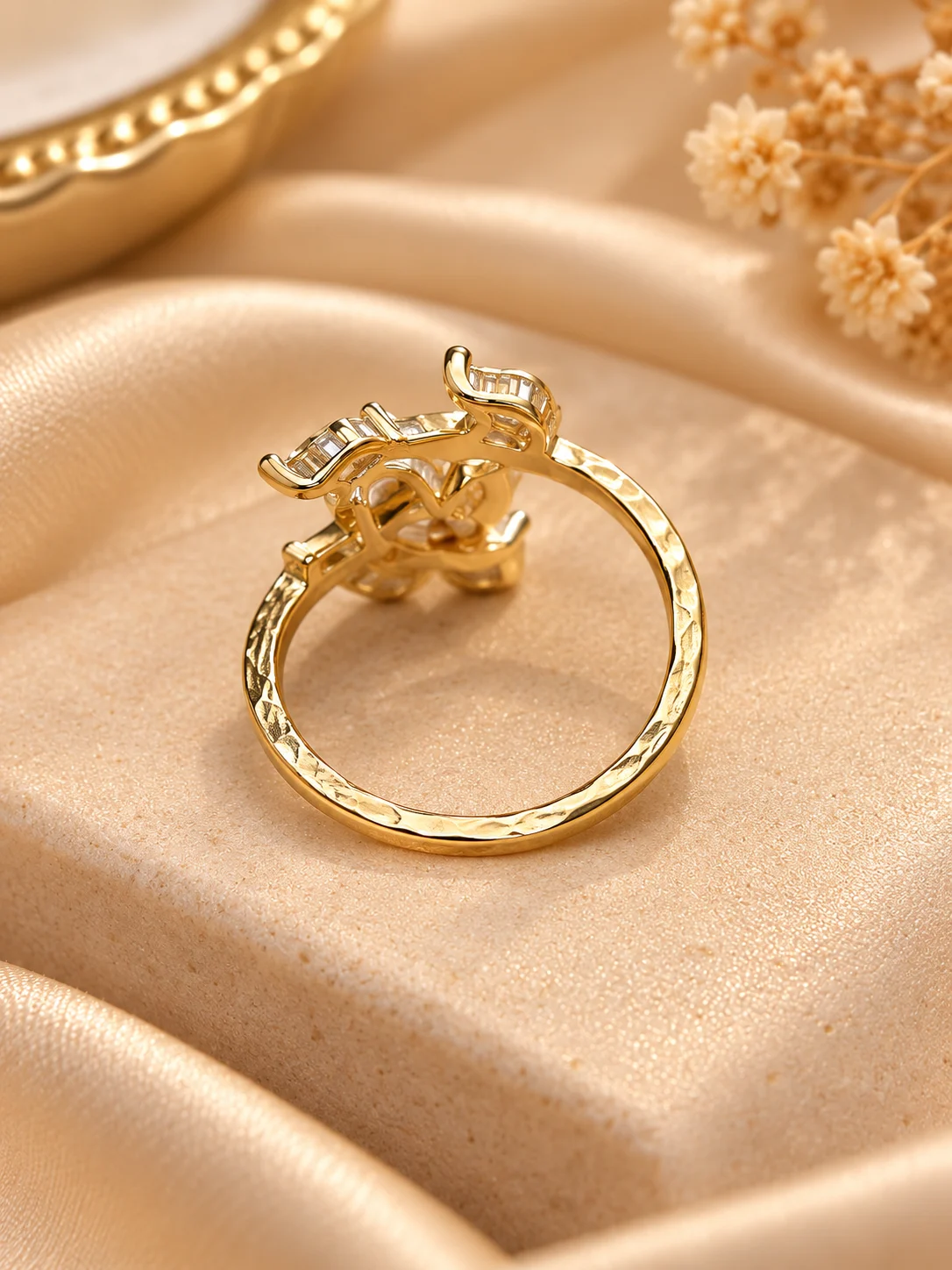Gold tone flower ring with red enamel petals and clear sparkling stones (2)