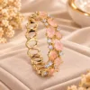Imported Peach Stone and Bead Bracelet with clear stones and gold tone finish