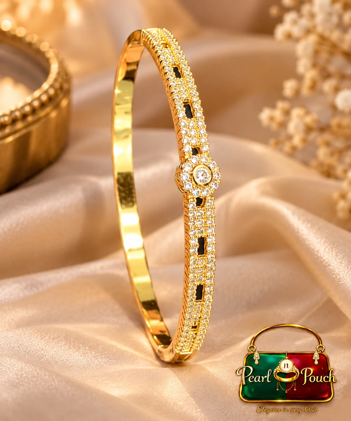 Premium 18K Gold Plated Zirconia Bangle by Zuping (3) Premium 18K Gold Plated Zirconia Bangle by Zuping with zirconia stone detailing and central circular motif
