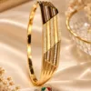 Premium 18K Gold Plated Zirconia Bangle by Zuping with sparkling zirconia detailing and geometric diamond style craftsmanship