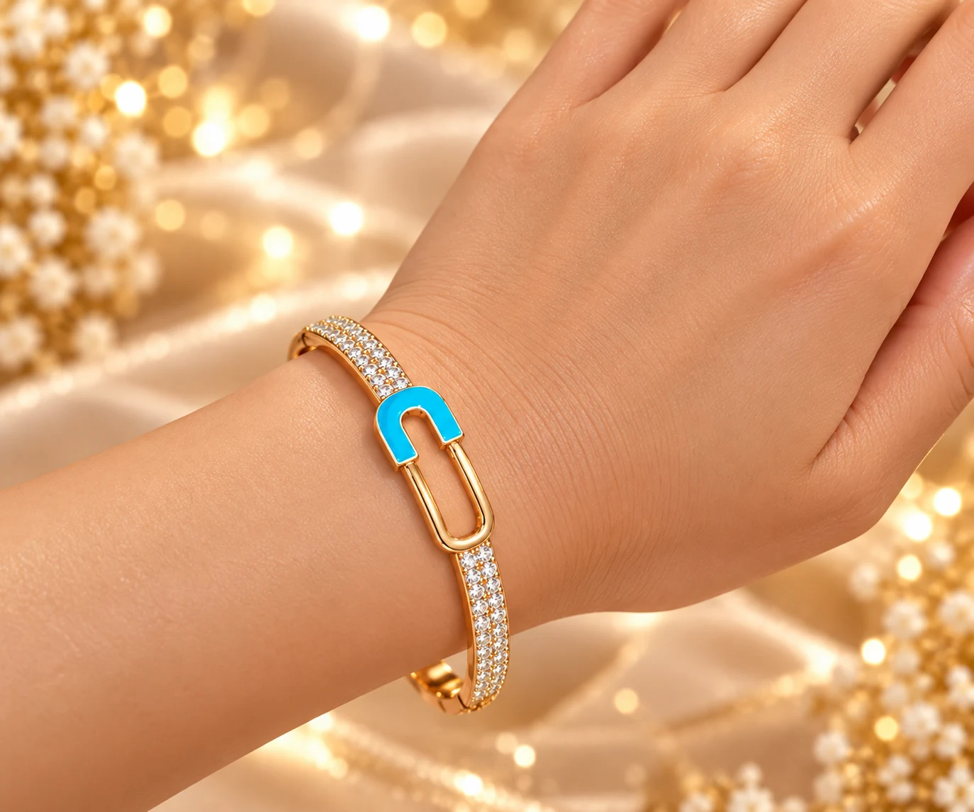 Premium 18K Gold Plated Zirconia Designer Bangle by Zuping (1) Premium 18K Gold Plated Zirconia Designer Bangle by Zuping with blue designer lock and sparkling zirconia stone detailing