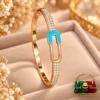 Premium 18K Gold Plated Zirconia Designer Bangle by Zuping with blue designer lock and sparkling zirconia stone detailing