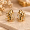 Elegant 18K Gold Plated Zirconia Fan Earrings with sparkling clear stones and sculpted detailing