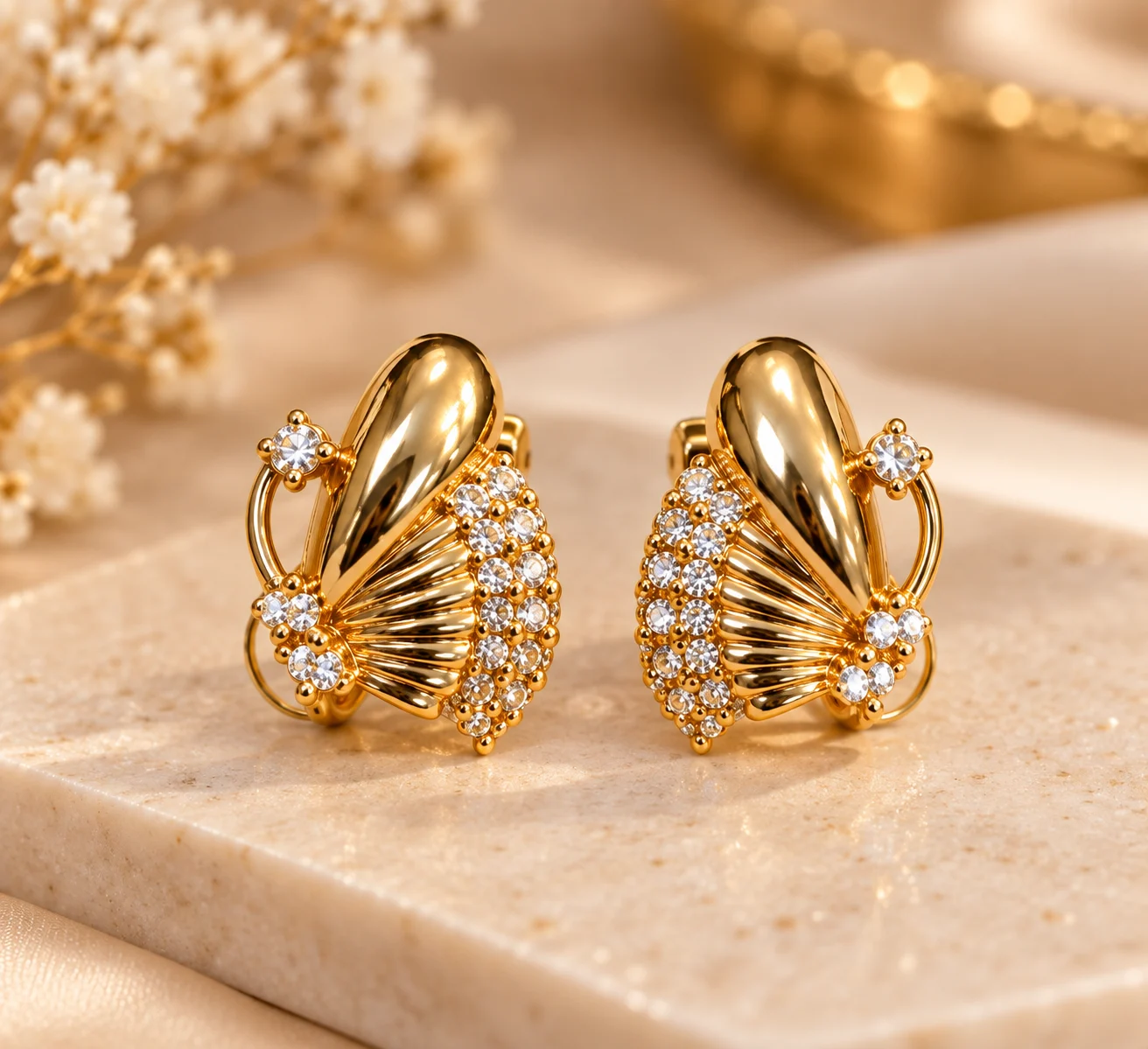 Radiant Fan 18K Gold Plated Zirconia Earrings (3) Elegant 18K Gold Plated Zirconia Fan Earrings with sparkling clear stones and sculpted detailing