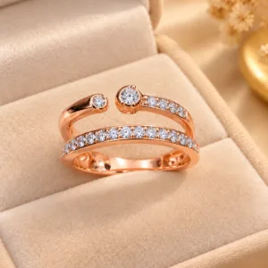 Exquisite rose tone open ring with sparkling clear stones and polished finish