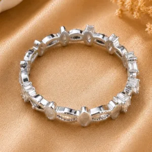 Silver-tone ring with oval and baguette-style clear stones