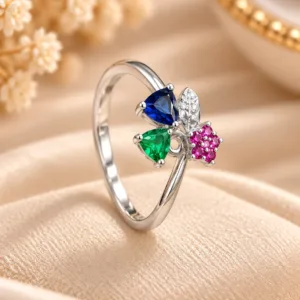 Silver tone floral gemstone ring with blue, green and pink stones