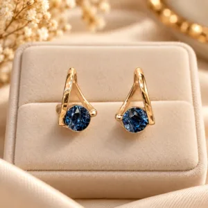 Stunning 18K Gold Plated Zirconia blue stone drop earrings with an elegant open-frame design