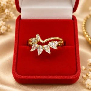 Gold tone floral ring with sparkling clear leaf-shaped stones