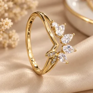 Gold tone floral ring with sparkling clear leaf-shaped stones