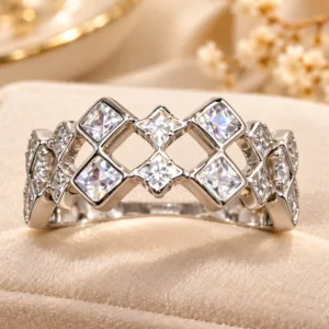 Silver tone geometric statement ring with clear stones and open design