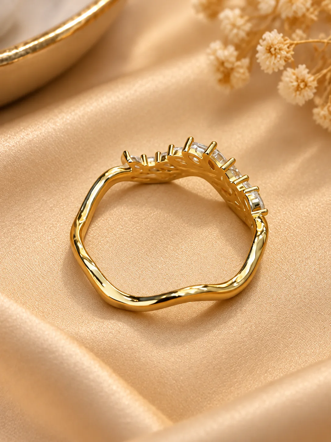 Stunning Wavy Crystal Gold Tone Ring (4) Stunning gold tone crystal ring with wavy band and clear sparkling stones