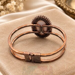Vintage Copper Tone Oval Cabochon Metal Bracelet with dark halo stones