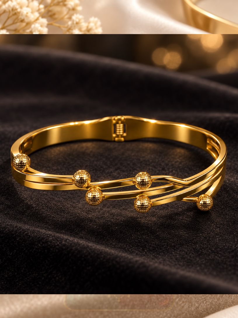Polished Gold Tone Multi-Strand Metal Bracelet Polished Gold Tone Multi-Strand Metal Bracelet