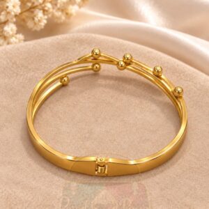 Polished Gold Tone Multi-Strand Metal Bracelet