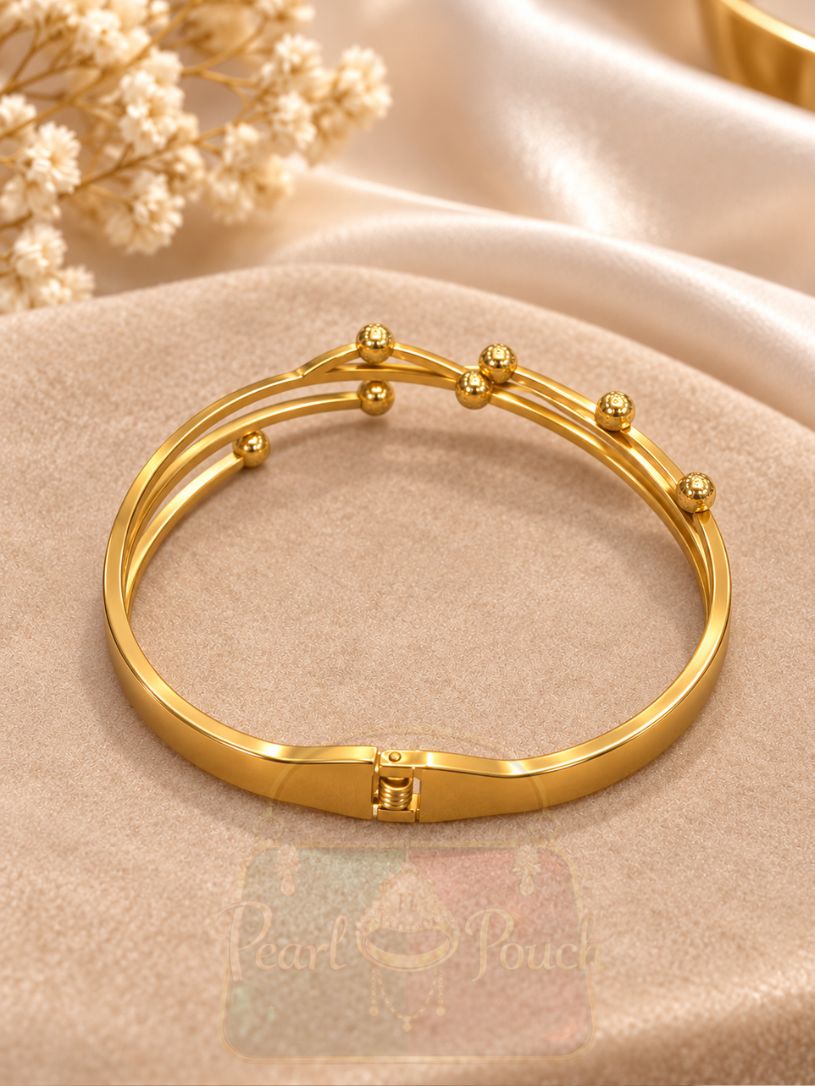 Polished Gold Tone Multi-Strand Metal Bracelet Polished Gold Tone Multi-Strand Metal Bracelet