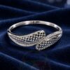 XUPING 18K Plated Silver Tone Double Leaf Bangle with lattice details