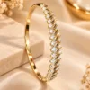 Elegant 18K Gold Plated Zirconia KADA Bracelet by XUPING with leaf-pattern detailing