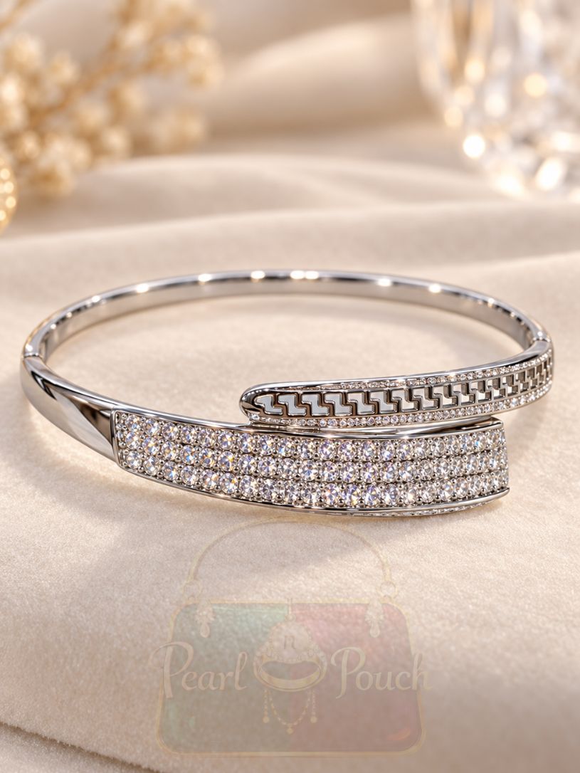XUPING Silver Tone Crystal Wrap Bangle with asymmetric overlapping ends front