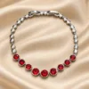 ZUPING Silver Plated Zirconia Bracelet with adjustable free-size chain and red stone detailing.