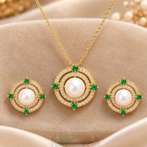Zirconia pendant set with green crystal beads and matching earrings in gold tone finish