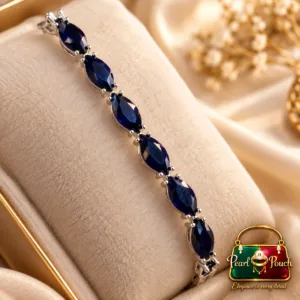 Elegant Silver-Plated Blue Stone Bracelet by Zuping with deep blue faceted stones and polished silver-plated detailing