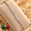 Premium Silver-Plated Zirconia Bracelet by Zuping displayed on a beige jewellery cushion.
