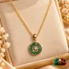 18K Gold Plated Green Zirconia Pendant Necklace by Zuping featuring a circular pendant with green stones and a clear centre stone.