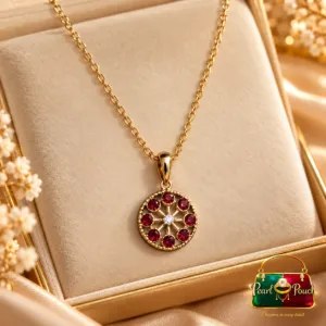 18K Gold Plated Red Zirconia Pendant Necklace by Zuping featuring a circular pendant with red stones and a clear centre stone.