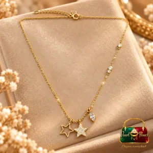 18K Gold Plated Zirconia Star Charm Necklace by Zuping with an open star, a stone-decorated star, a marquise-shaped charm and clear chain accents.